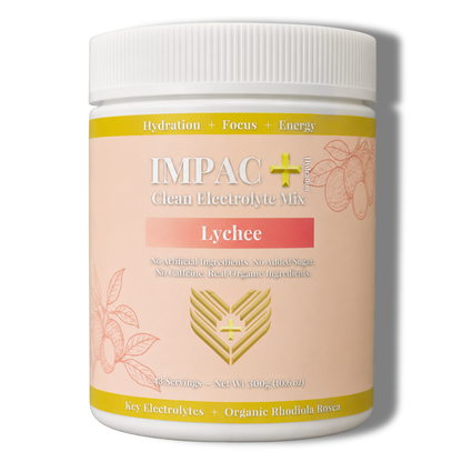 A white plastic bottle of IMPAC+ Clean Electrolyte Mix in the Lychee flavor, featuring a peach-colored label with gold and pink accents, set against a plain white background with a soft shadow.